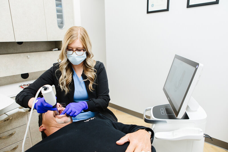 A prosthodontist at Peak Prosthodontics in Lethbridge, after dental surgery, reminds patients of post-op instructions to take all prescribed antibiotics and monitor for allergic reactions to ensure safe recovery.