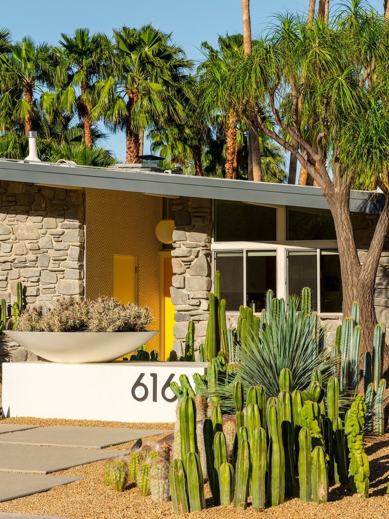 Front view of mid-century modern home with revamped landscape designed by Los Angeles architect.
