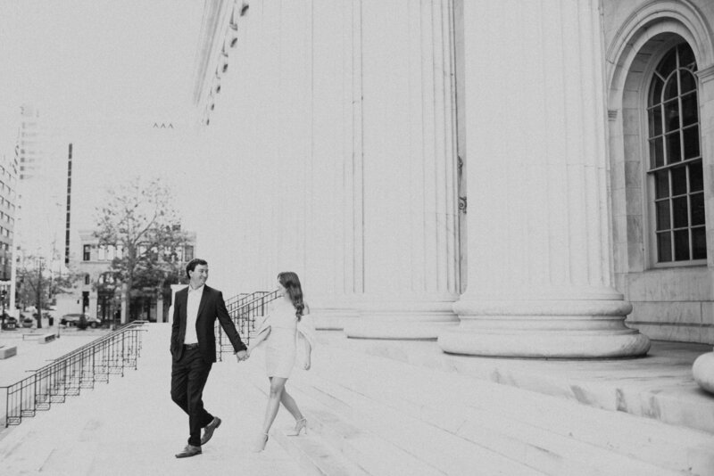 man and woman holding hands