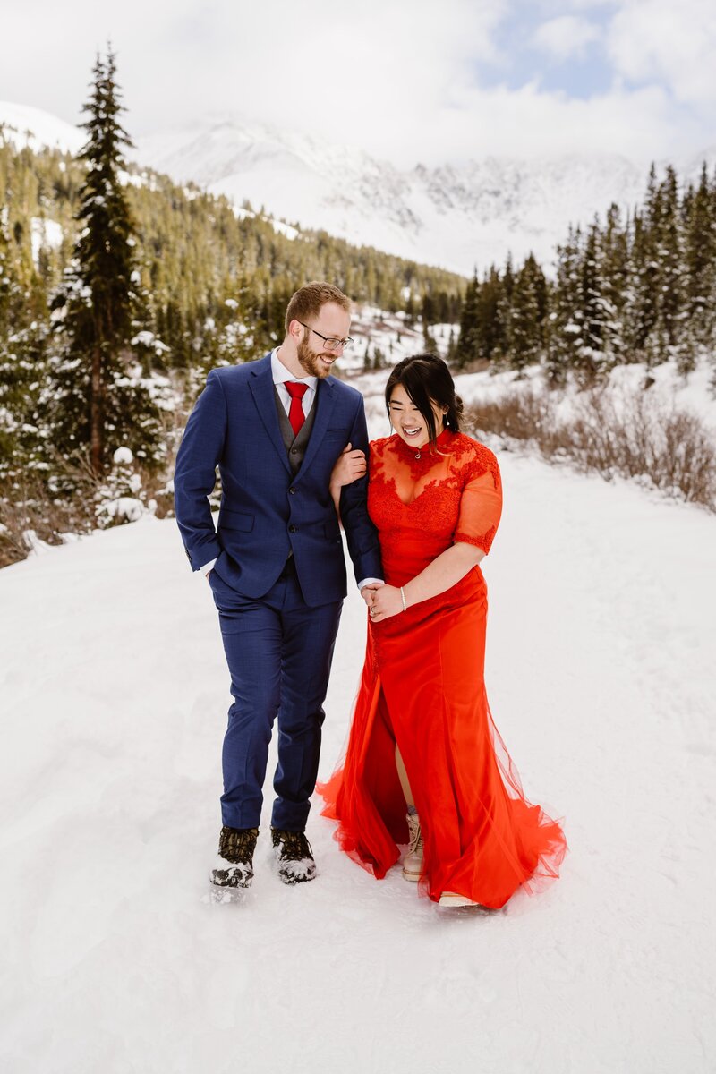 Couple snowshoes for their winter Colorado elopement
