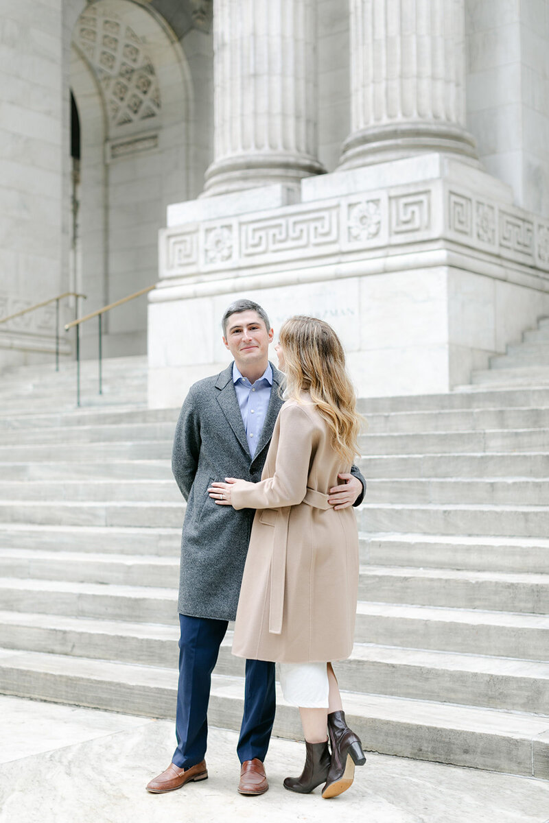 couple-hugging-winter-engagement-session