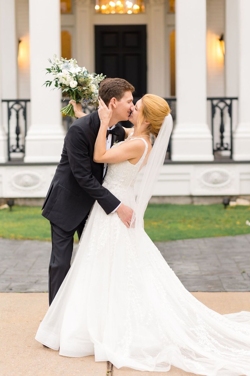 Bride and groom kissing