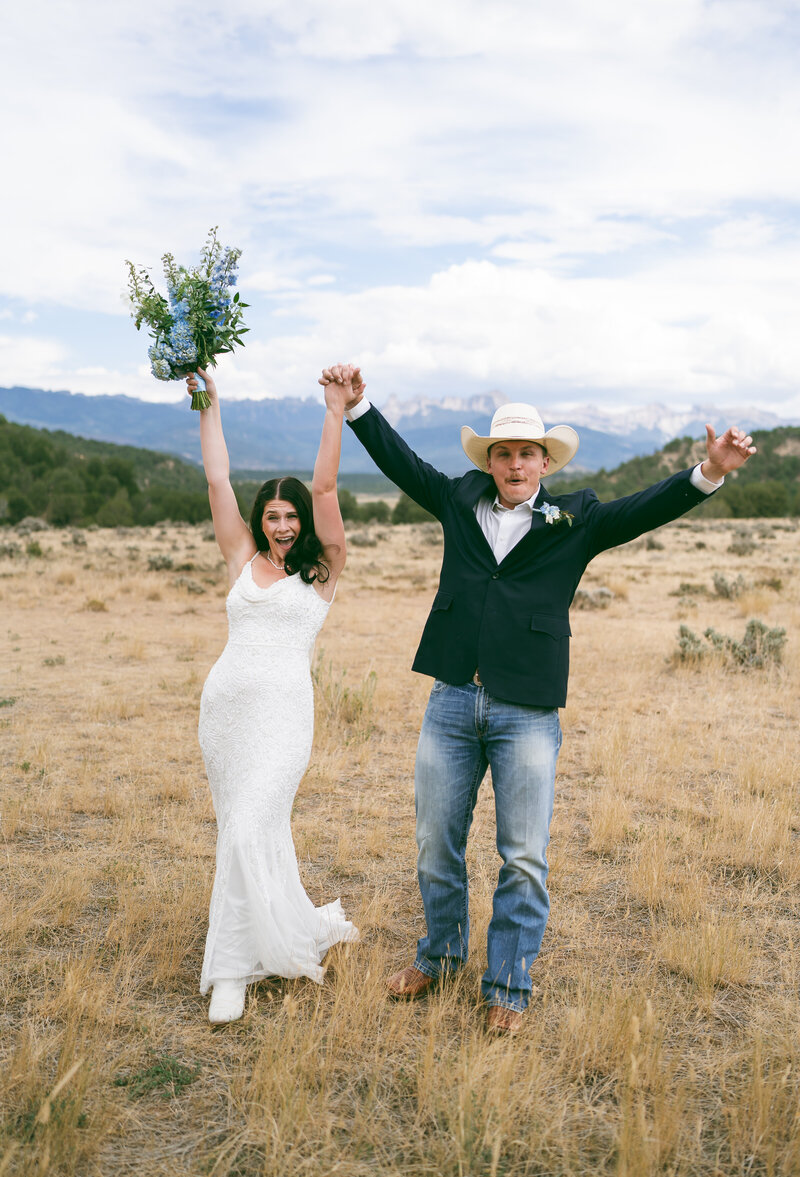 colorado elopement in ridgway state park, bride and groom celebrating