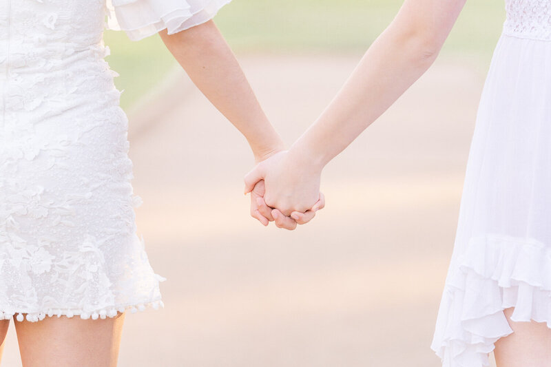 high school best friends holding hands in Ashburn, VA