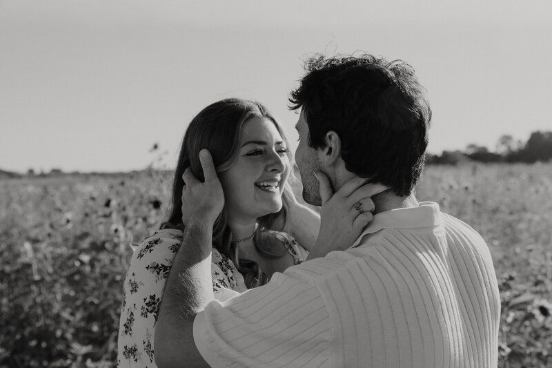 happy-engaged-couple-in-sunflowers-meg-pearson-photography-midwest
