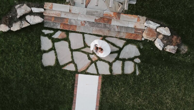 Drone shot of couple in a field