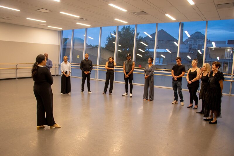 Morgan giving lesson to her students about dancing