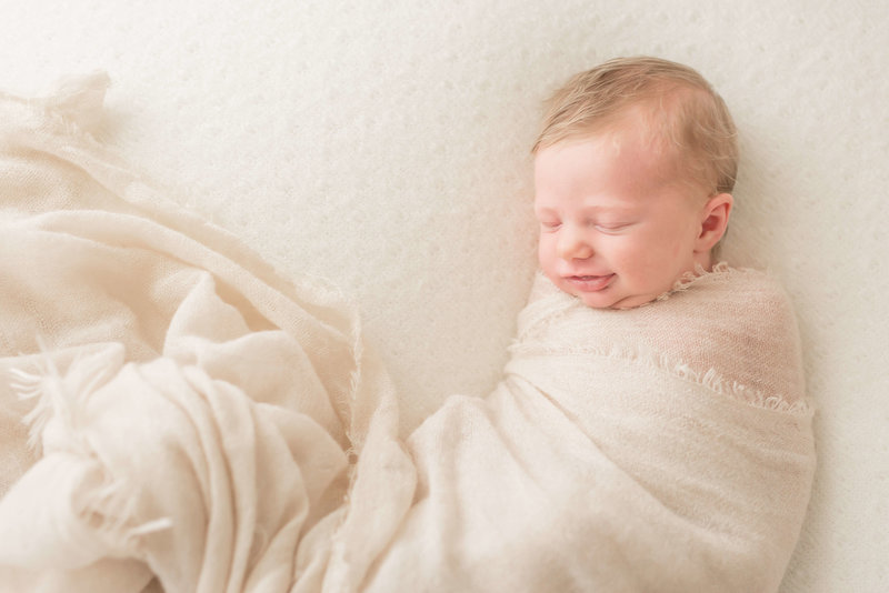 Smiling newborn in houston Smiling newborn in houston