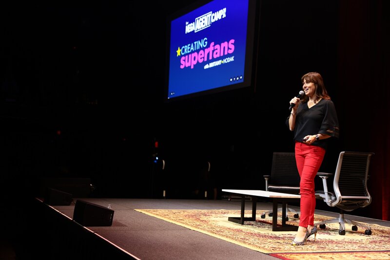 Brittany Hodak presenting her customer experience keynote on stage at the Keller Williams CEO Summit