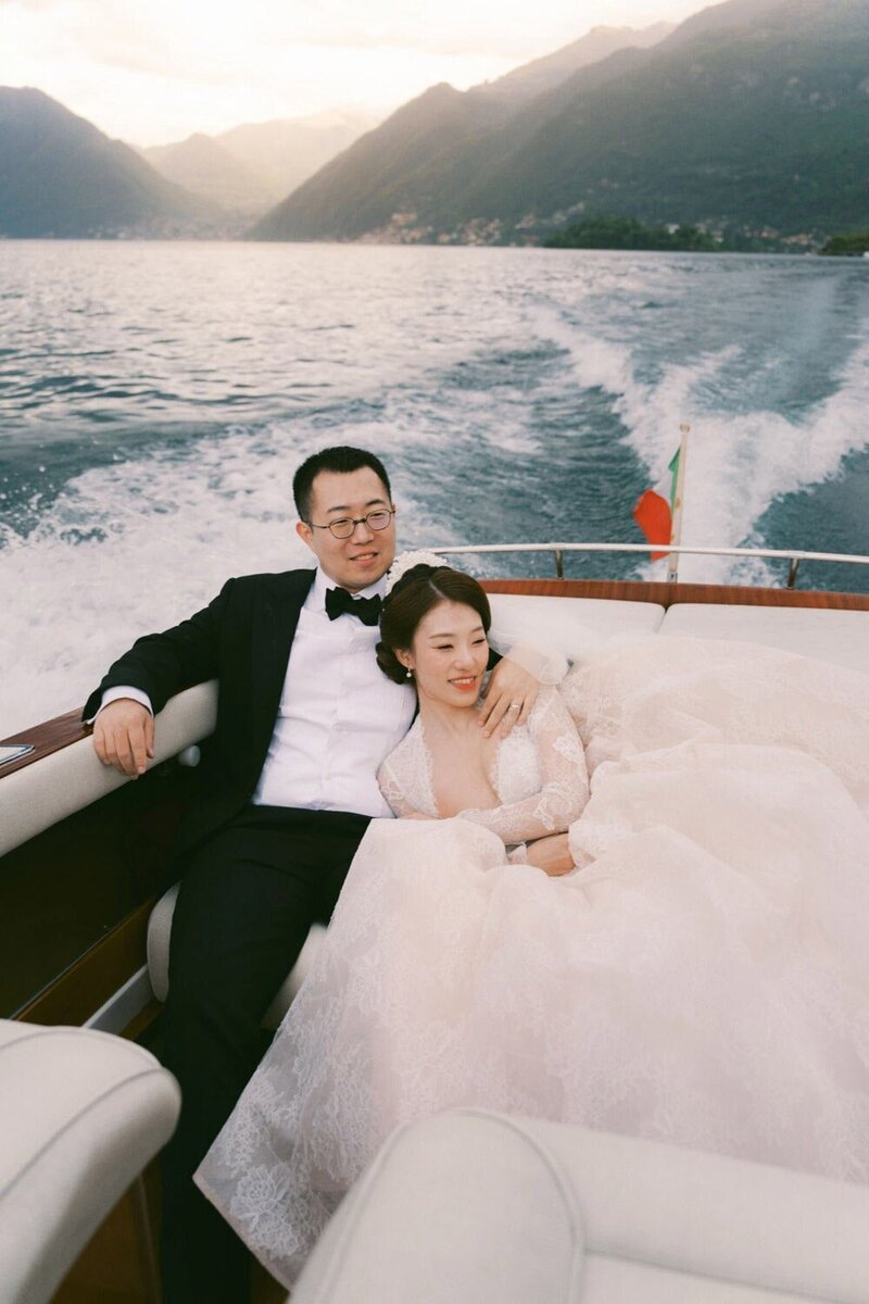 Boat photoshoot during a villa del Balbianello wedding, by Lake Como wedding photographer Andreas K. Georgiou  