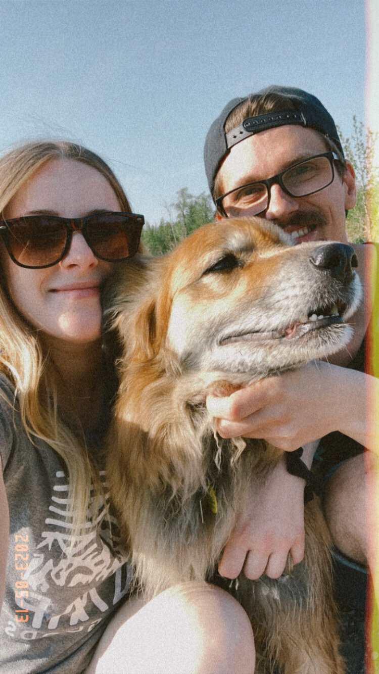 Alberta wedding photographer with her dog and husband