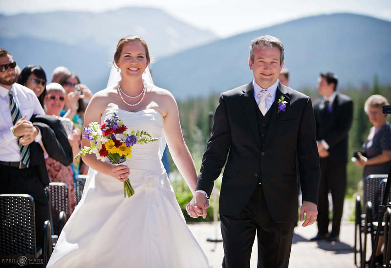 Sunny wedding day at Ten Mile Station at Breckenridge Ski Resort in Colorado