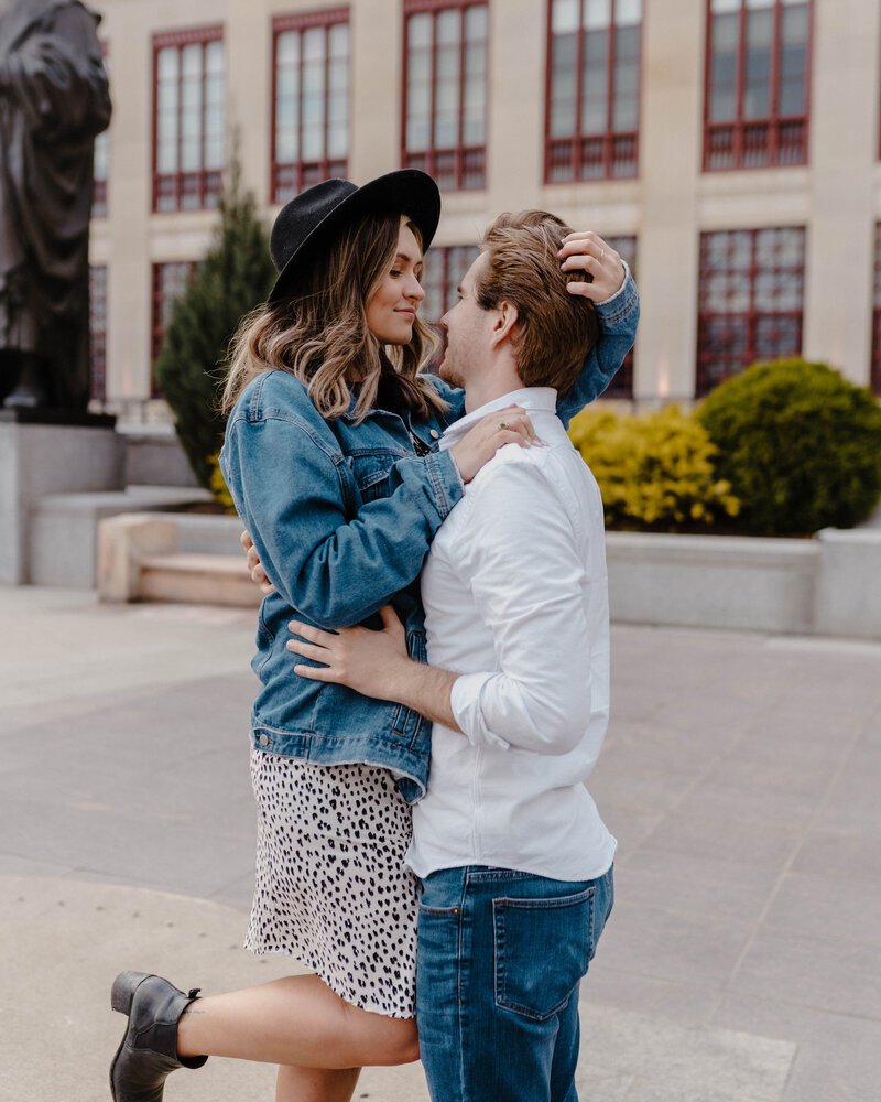 Man embracing women