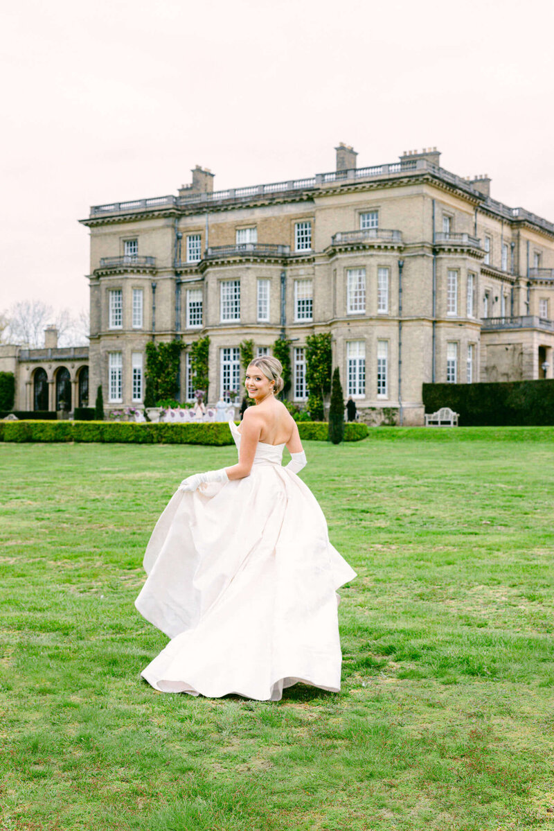 A wedding day picture of a bride in her white dress at Hedsor House in the UK
