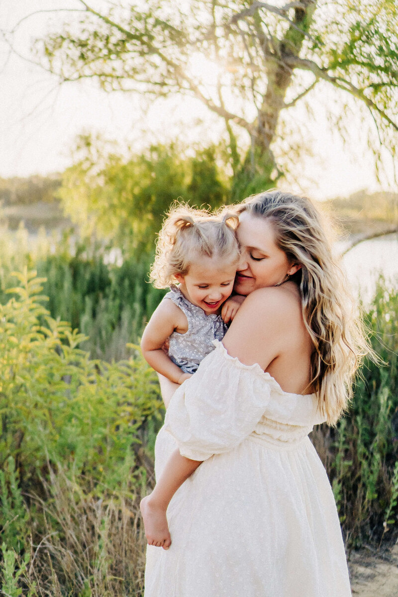 Dallas maternity photoshoot with mom and daughter at murrell park in flower mound texas