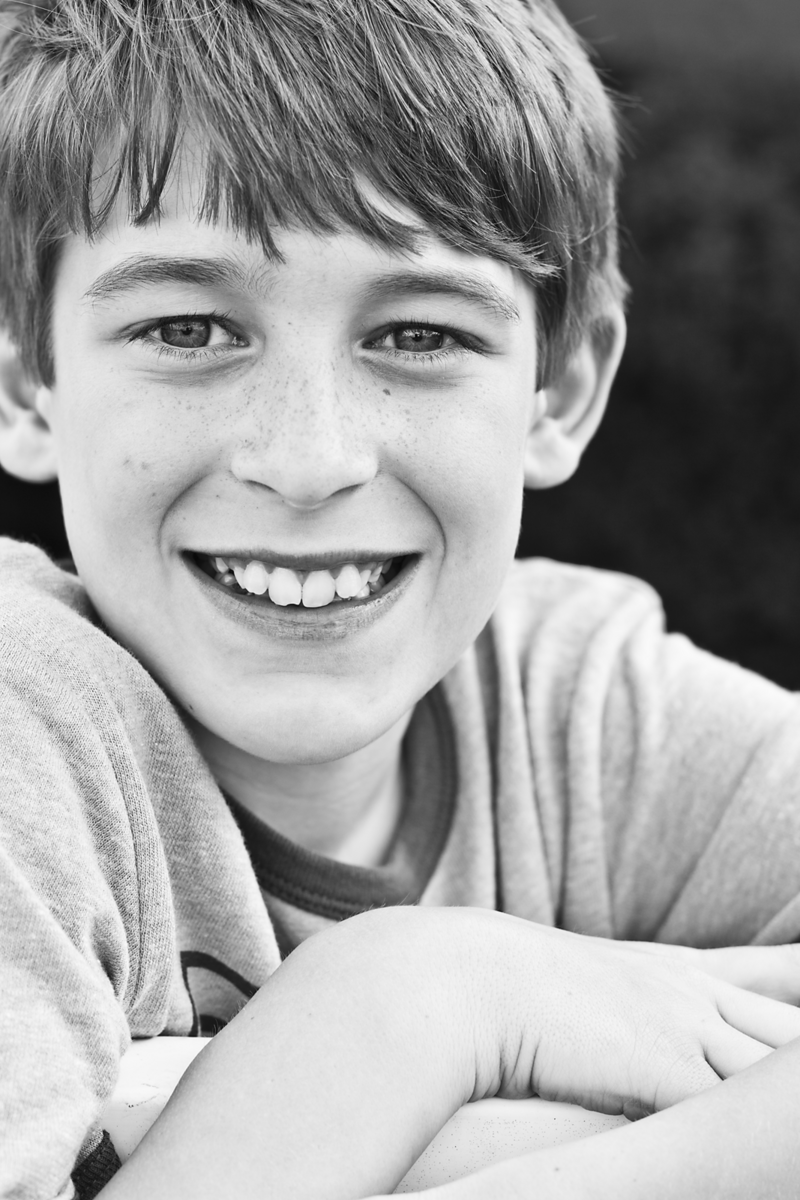 boy smiling for portrait photographer ohio