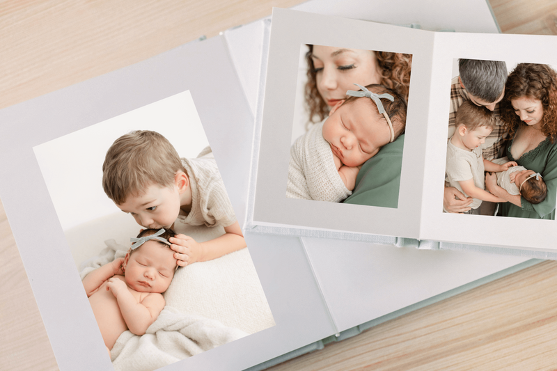 newborn photos in an heirloom album