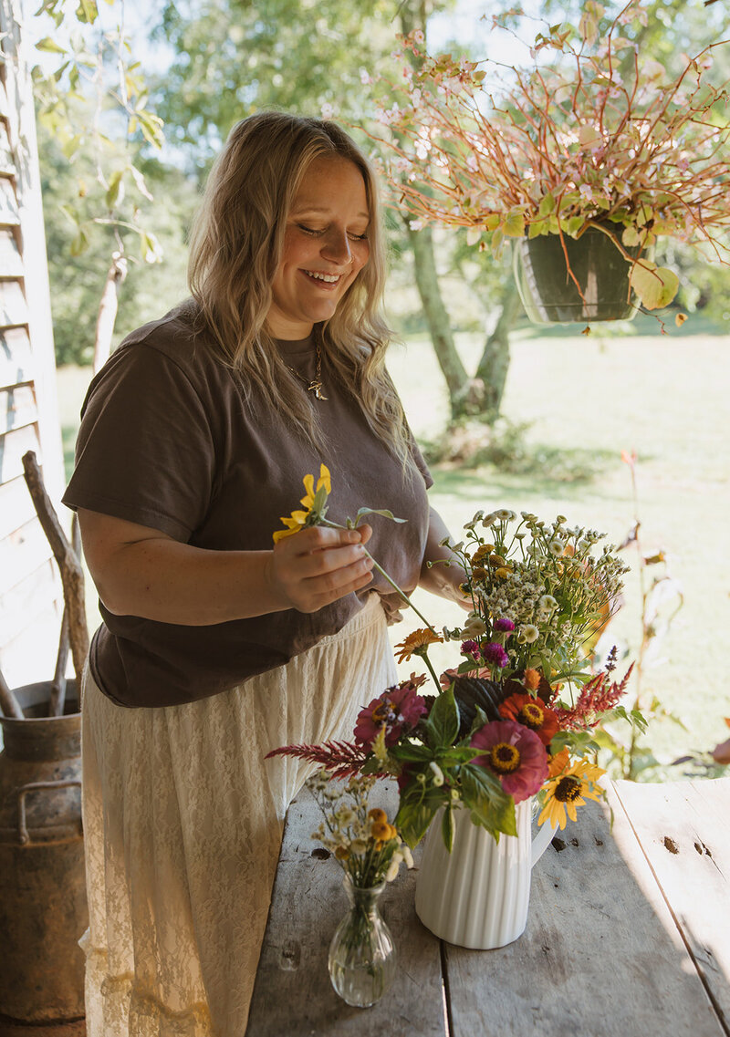 Photographer picking flowers