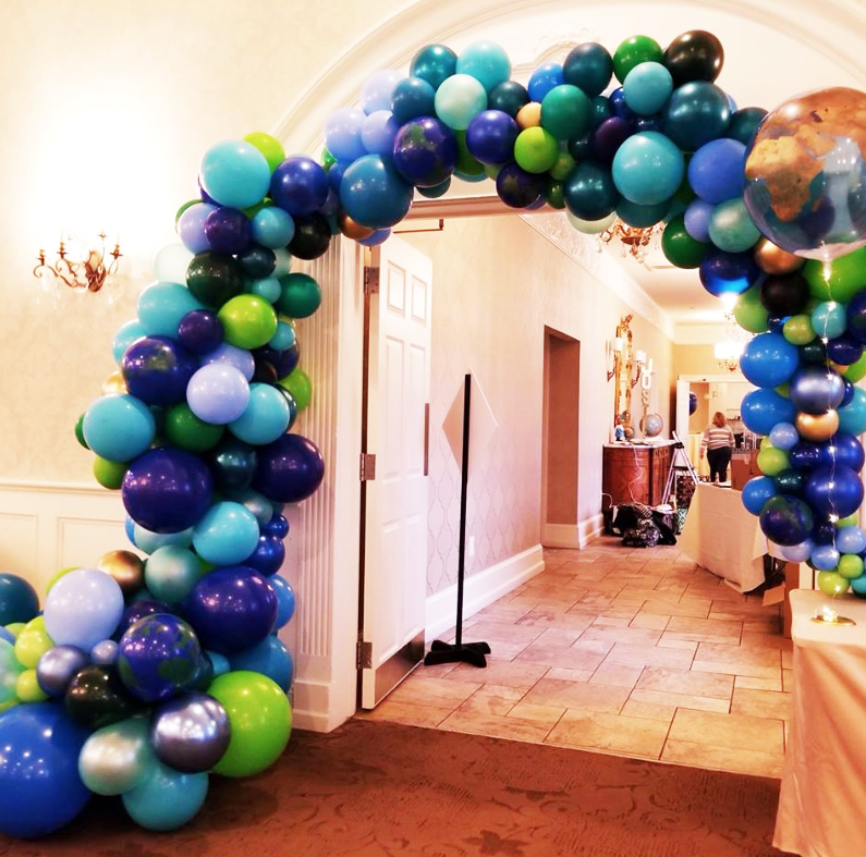 Custom Designed Balloon Arch Green and Blue Color Palette for Parties and Events