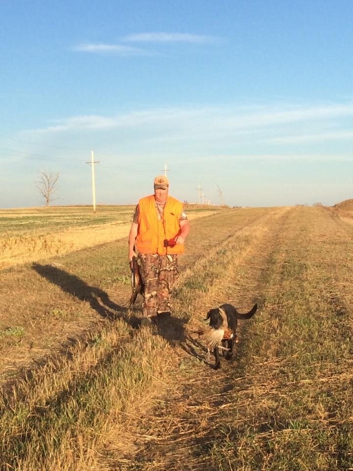 Todd with his dog out hunting