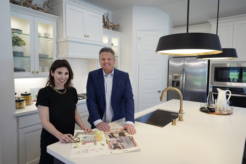 Jason Sickles and one of his agents getting ready to sell a house in the Dallas Fort Worth area.