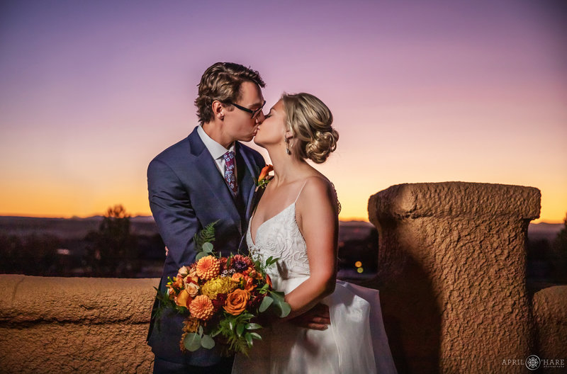 Mountain Views and Purple Orange Sunset Sky that matches Orange bridal bouquet with purple accents at Villa Parker