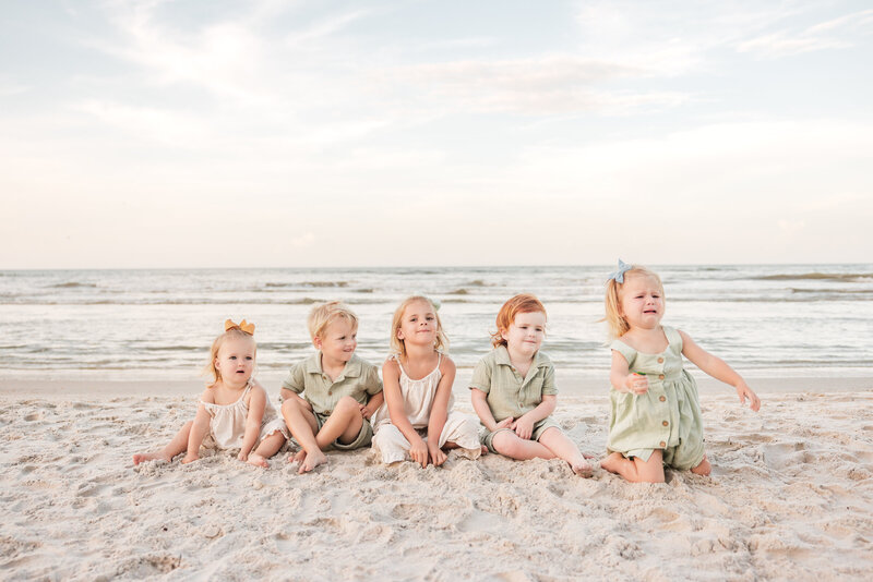 Candid portraits of cousins playing at New Smyrna Beach