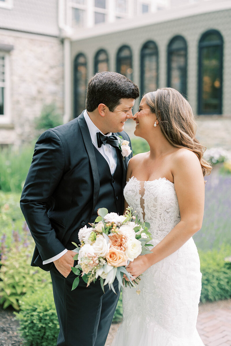 Bride and groom kiss for wedding at the willows of Ashcombe in Mechanicsburg