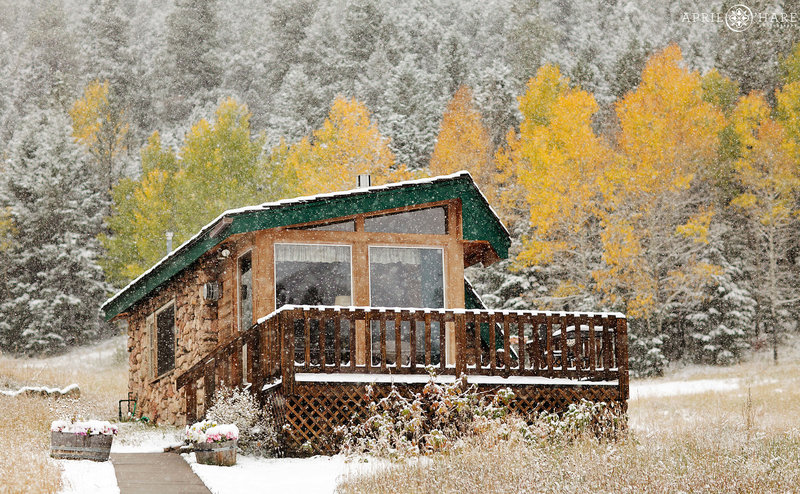 Honeymoon cabin at Meadow Creek Lodge & Event Center during fall color snow storm at October wedding