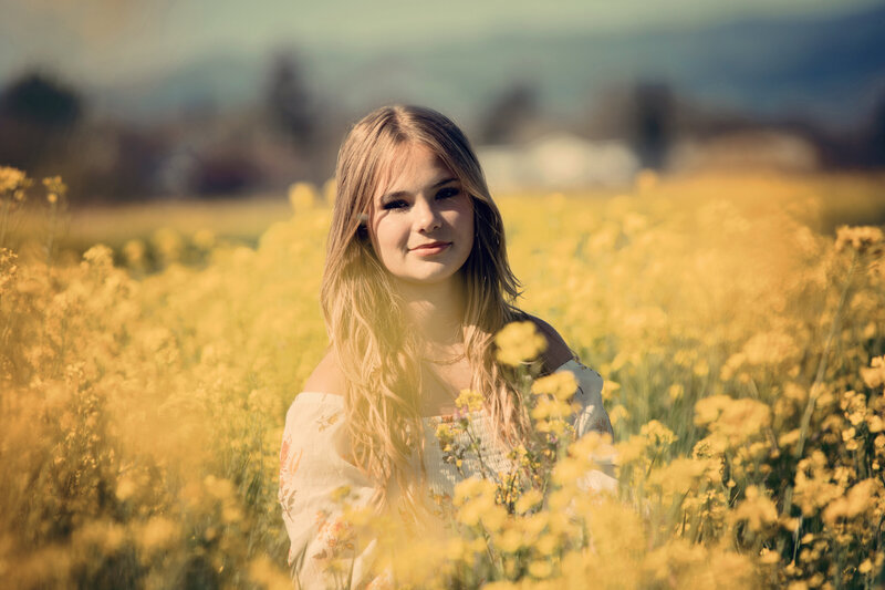 senior portrait in flower field