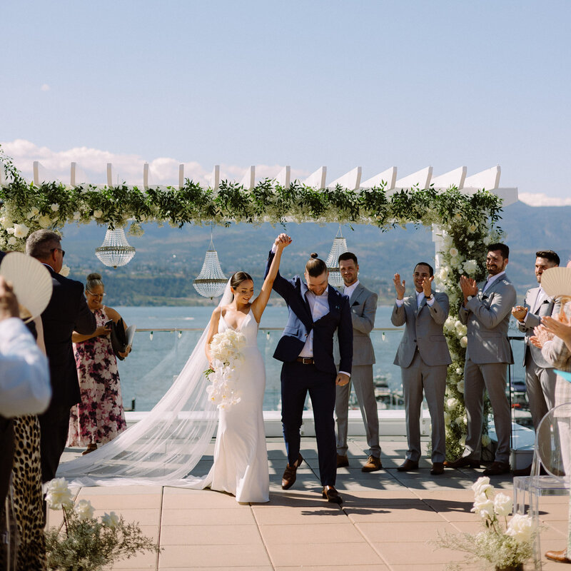 wedding couple celebrating at the el dorado rooftop after their ceremony