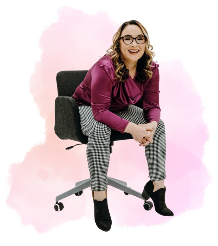 Rachael Woods, Digital Marketing Agency Owner with coffee on her computer