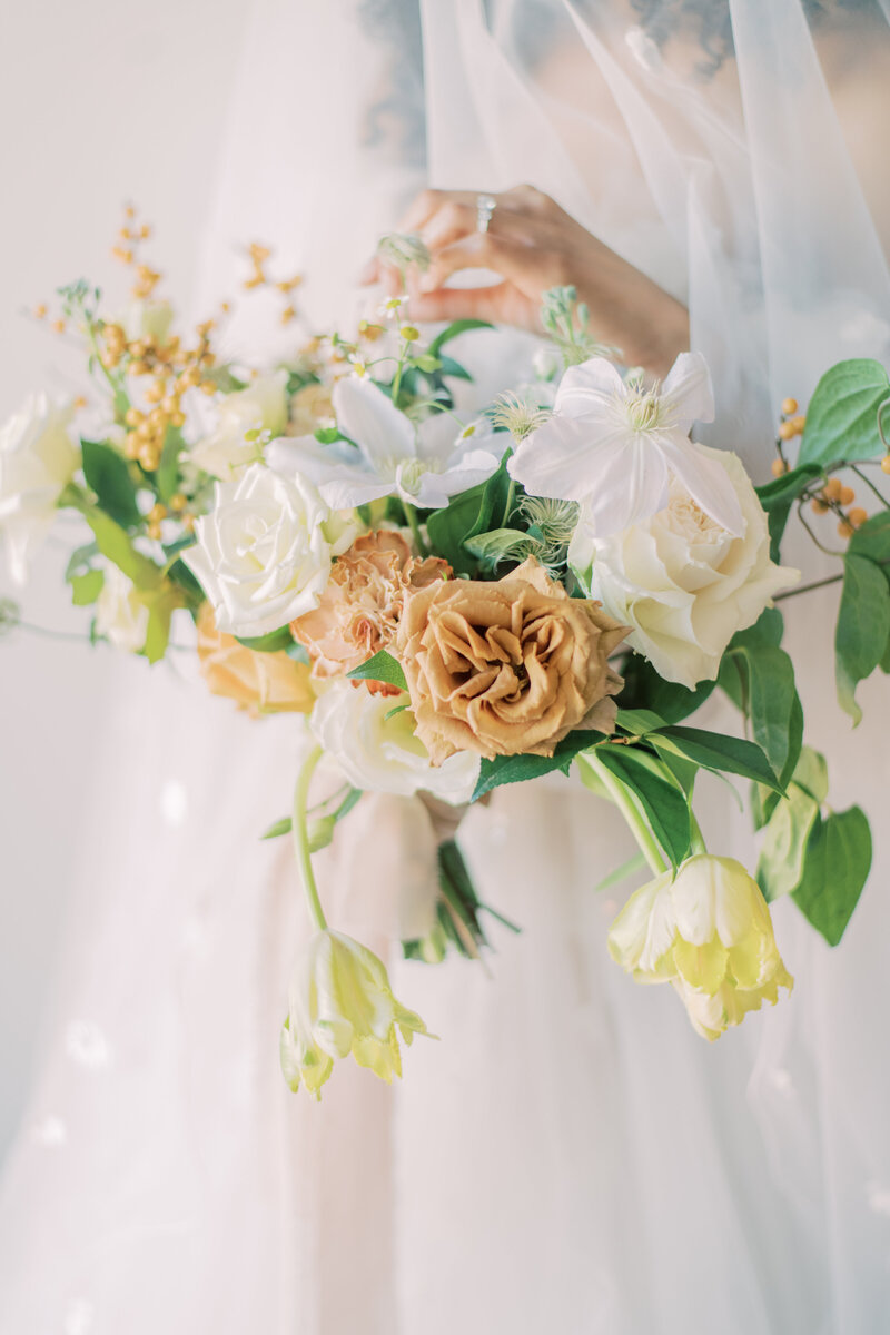 Bridal bouquet in Toronto Ontario that is yellow, orange and white.
