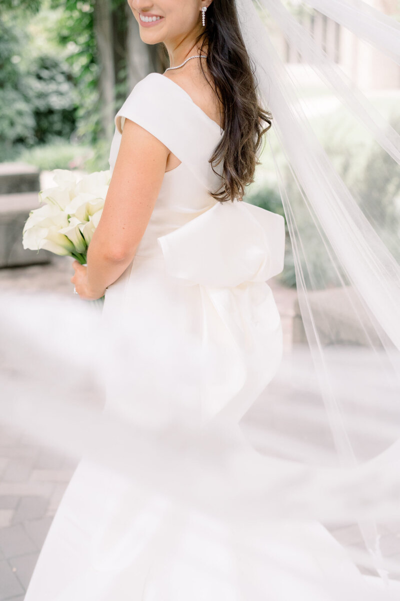 a mom hugging her daughter on her wedding day