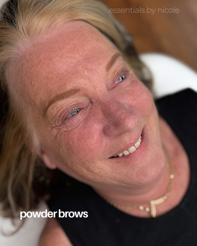 Soft-shaded powder brow tattoo for natural-looking permanent brows for mature client and mature skin