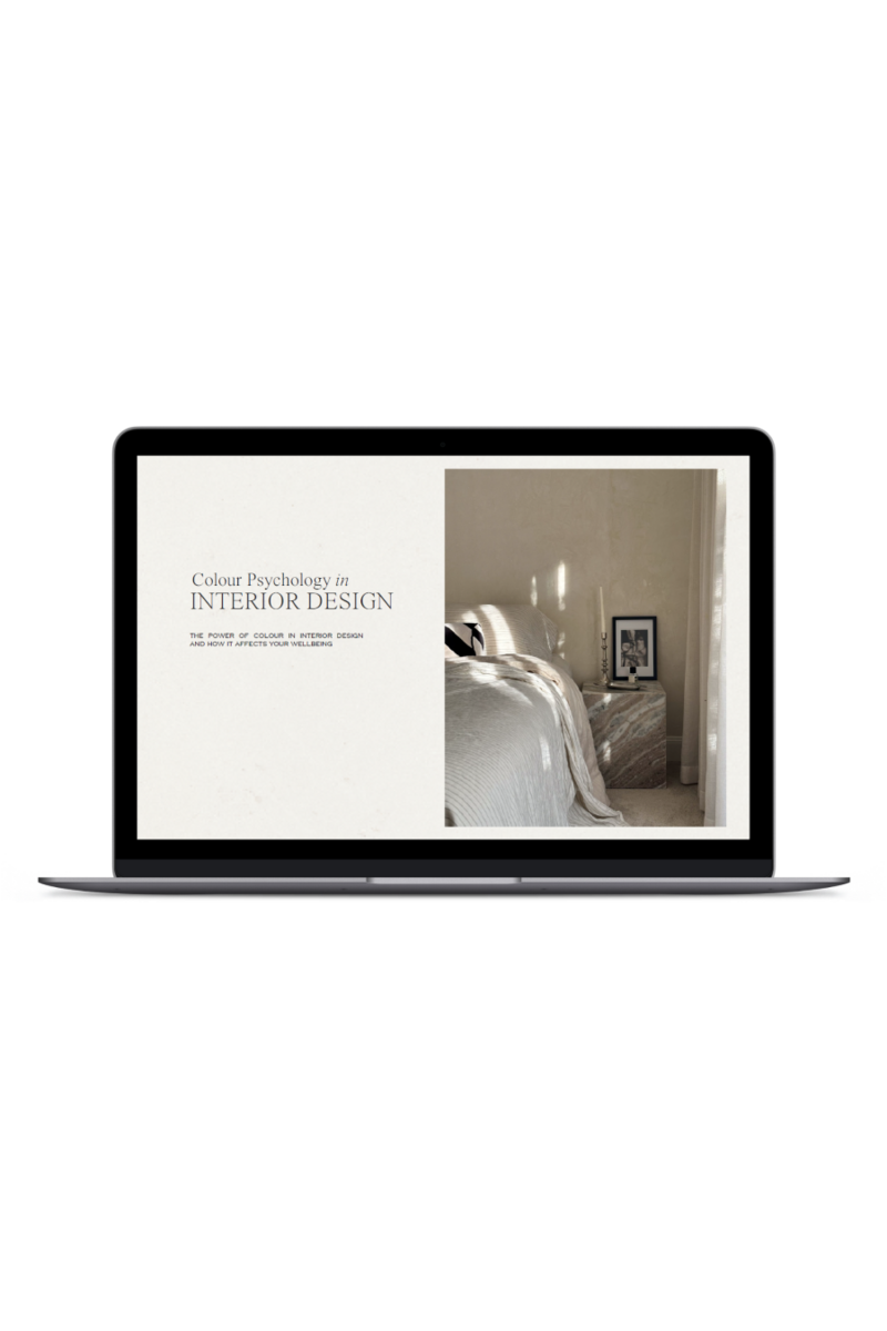 Laptop displaying the front cover of ‘Colour Psychology in Interior Design,’ an insightful guide offered as a free resource.