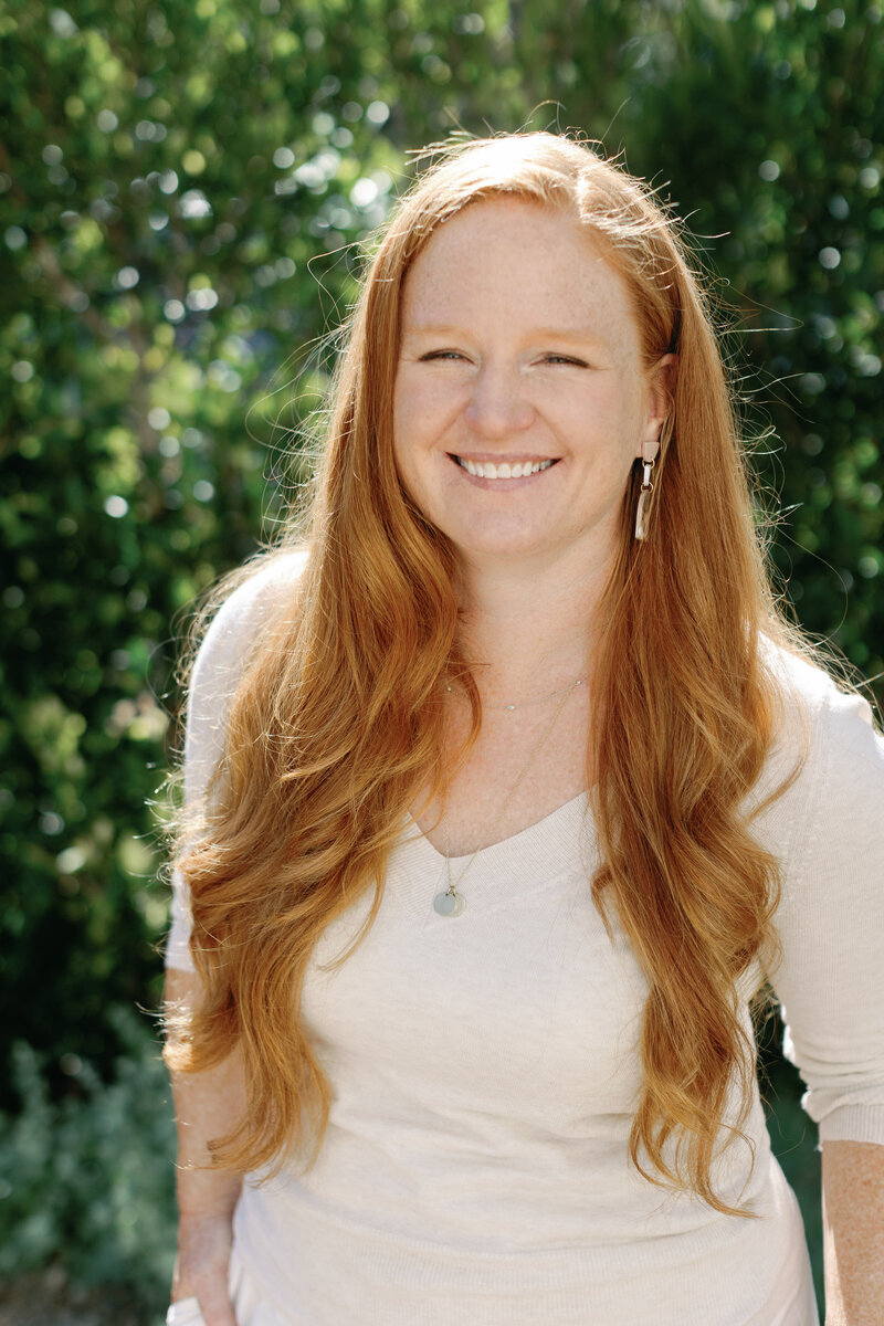 Smiling Headshot of Vermont Wedding Photographer, Coryn Kiefer