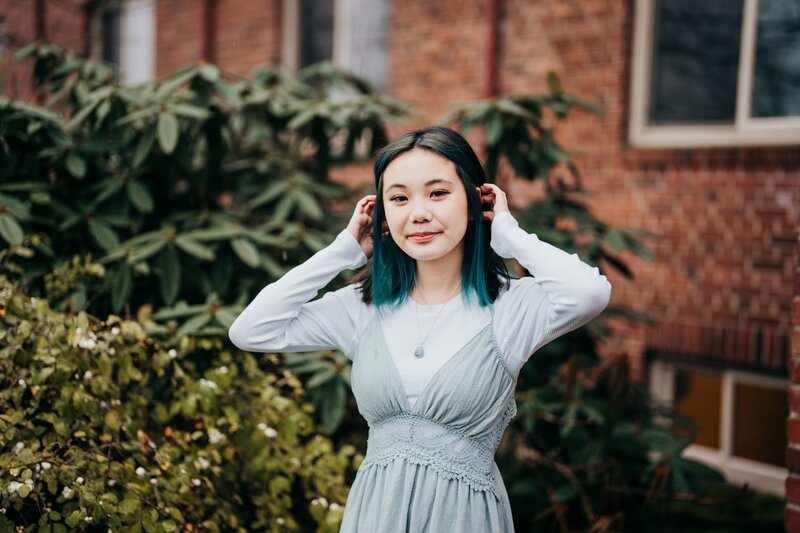 high-school-student-in-front-of-red-brick-building-at-luther-burbank