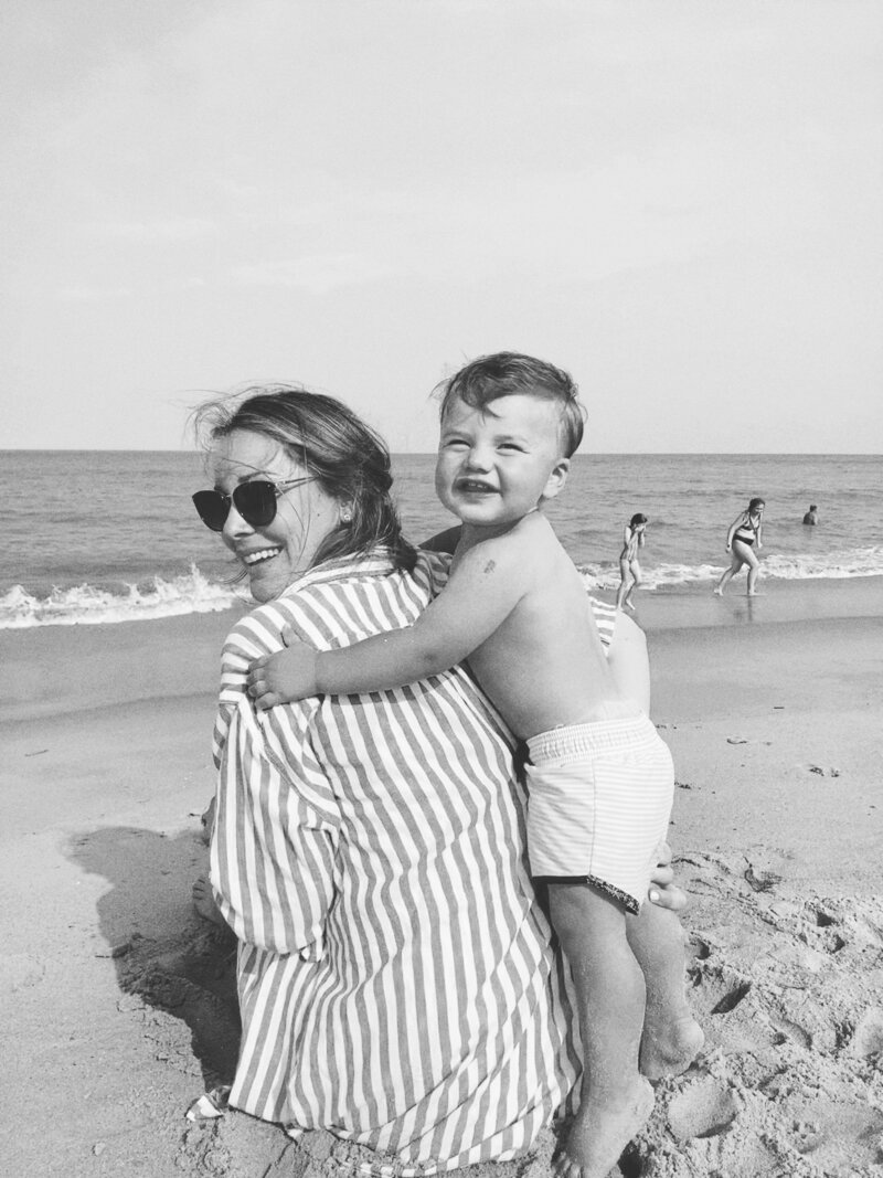 Tina Miller at the beach with her son
