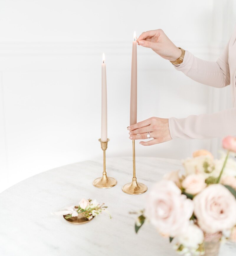 Lighting candles tablescape
