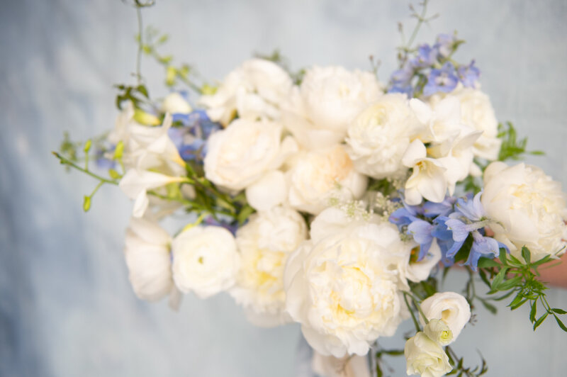 dusty blue and white bridal bouquet by trellis floral 