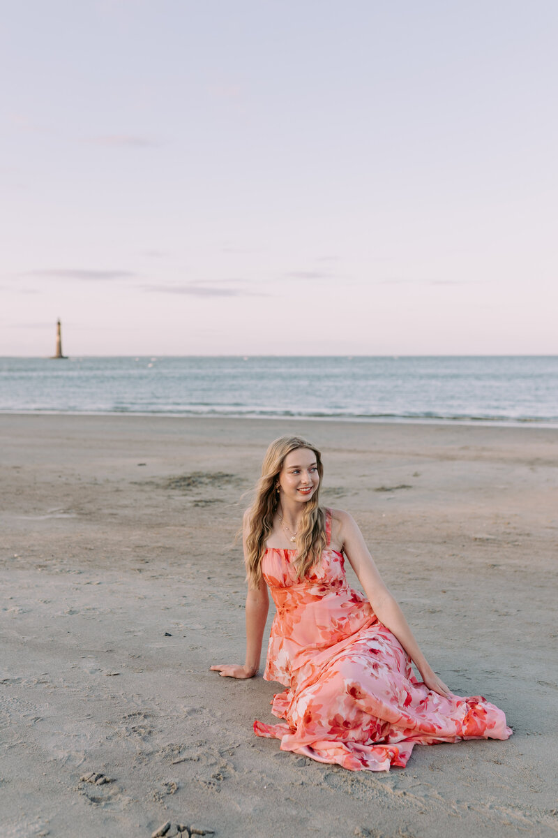 Bride and groom holding their hand while walking together at sunset on the evening of their wedding 