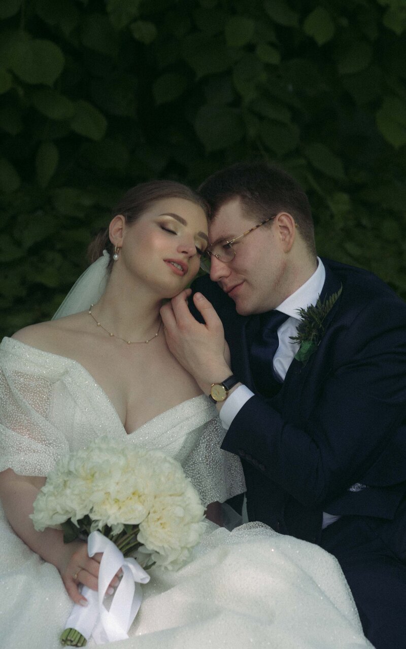 A heartfelt and intimate moment between a married couple, capturing their love and connection on their special day