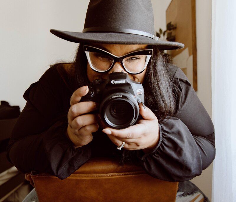 woman holding camera