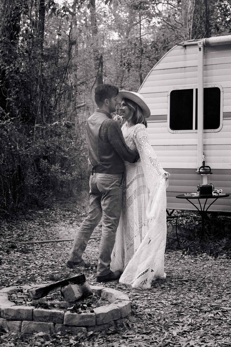 Couple's first dance in front of the camper they rented for their elopement