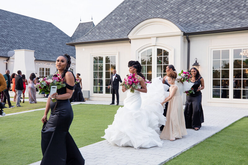 Swank Soiree Dallas Wedding Planner JacqueRae & Rashard - Bride and Bridesmaids walking outside