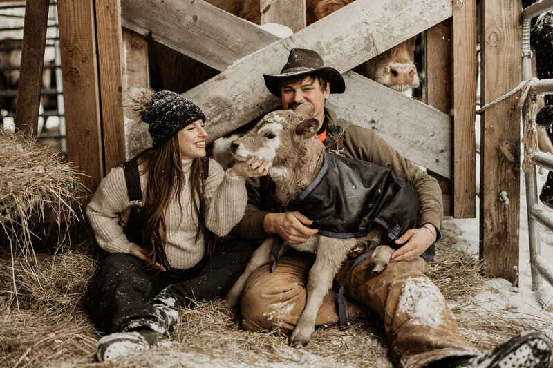 Farm couples photo with their dog