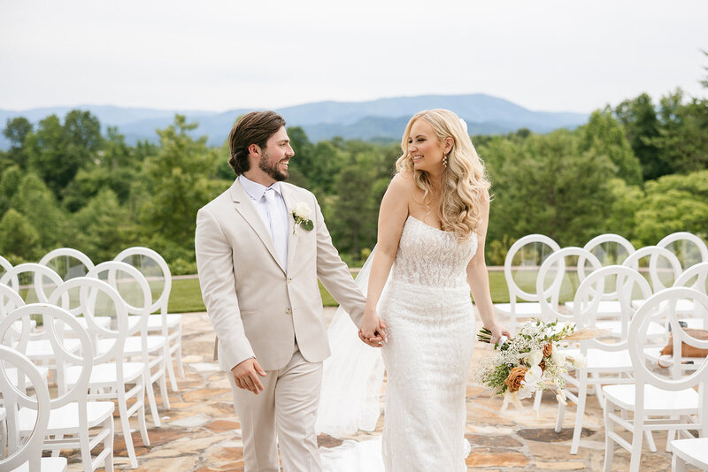Bride and groom walking down aisle at Nicholas Heir wedding