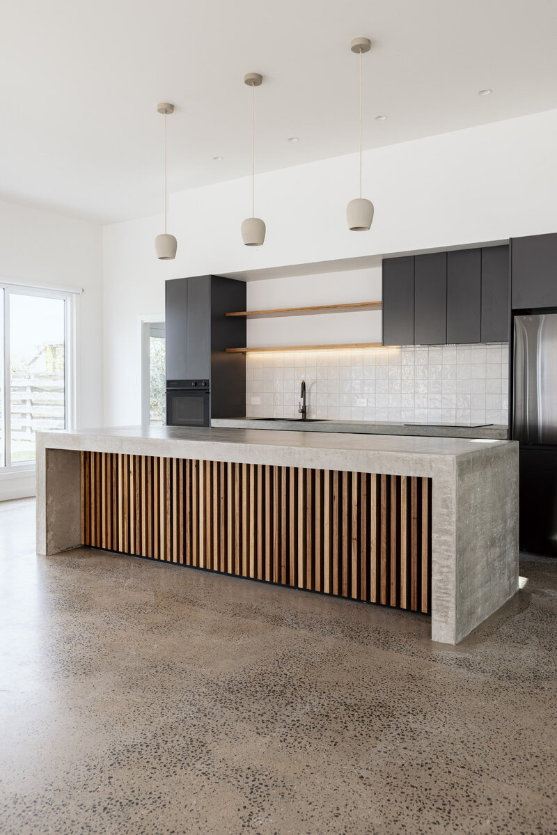 Sleek new kitchen build with timber and concrete finishes by WBK Building 
