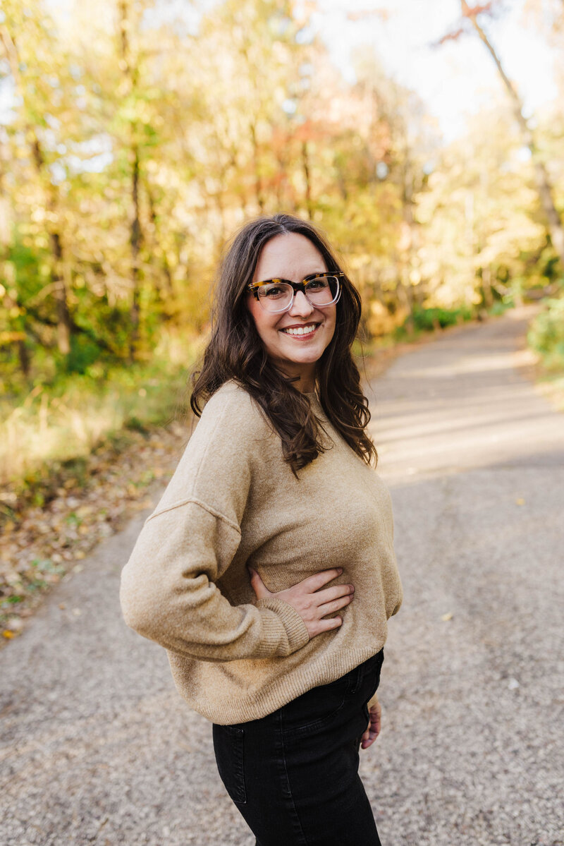 Amanda in a green shirt smiling